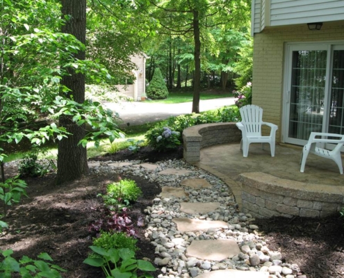 Cement Patio with Dry Stream Bed