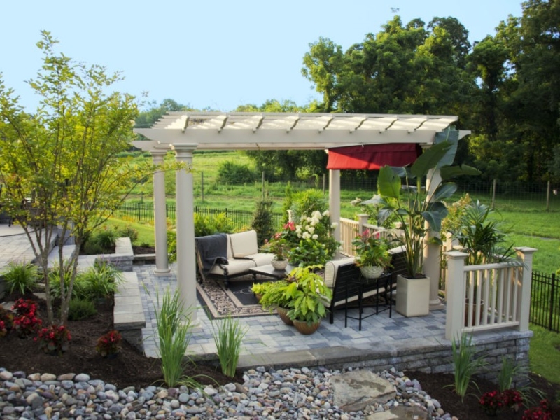 White Pergola on Stone Patio