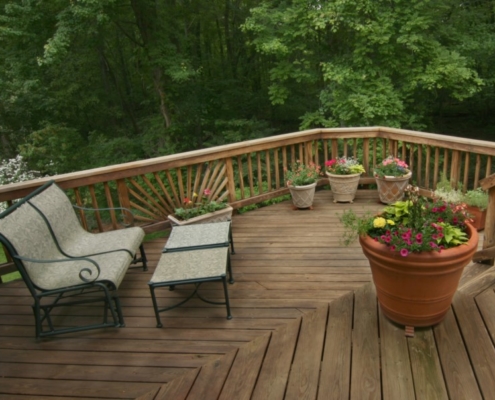 Wood Deck with Container Gardens, ornamental railing