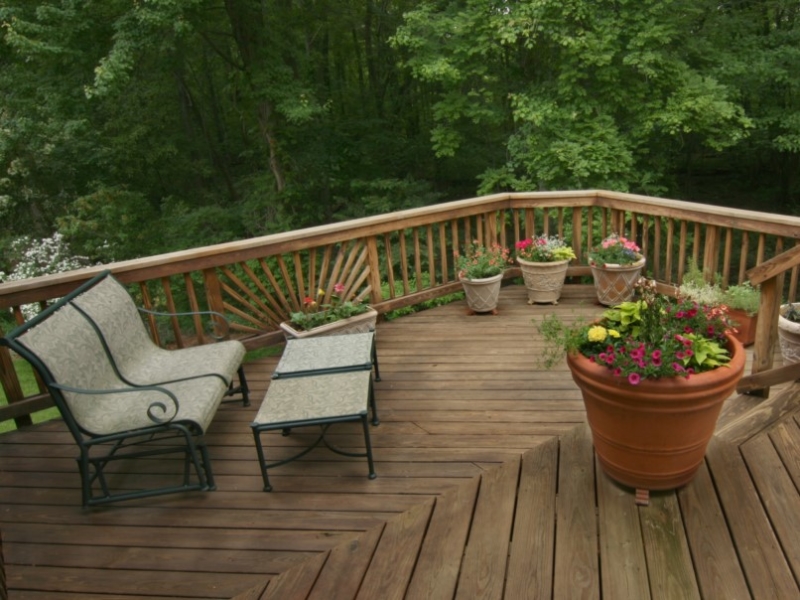 Wood Deck with Container Gardens, ornamental railing
